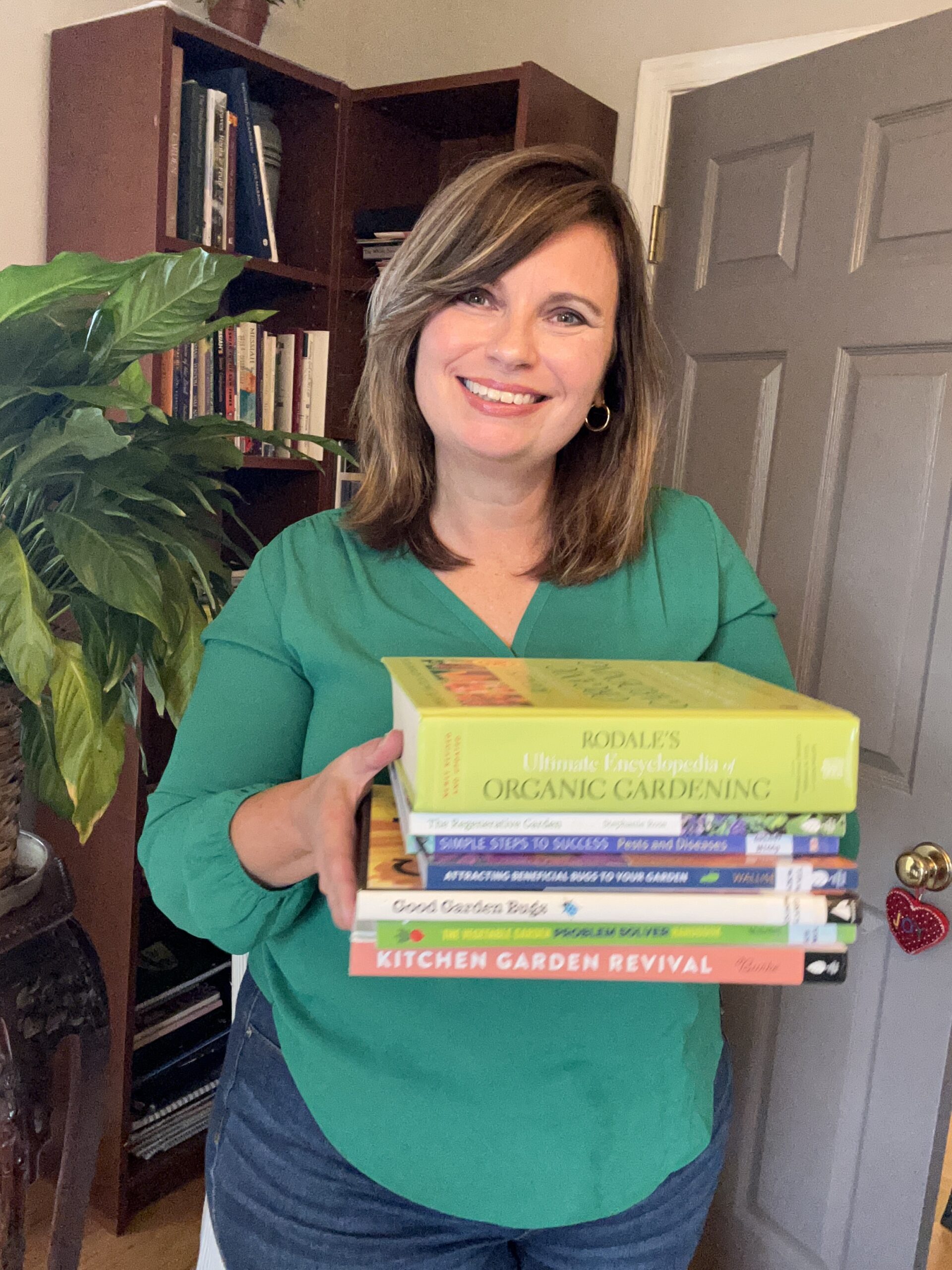 Image of woman holding books