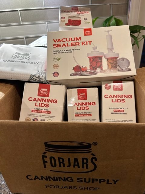 For Jars canning lids and equipment in a box