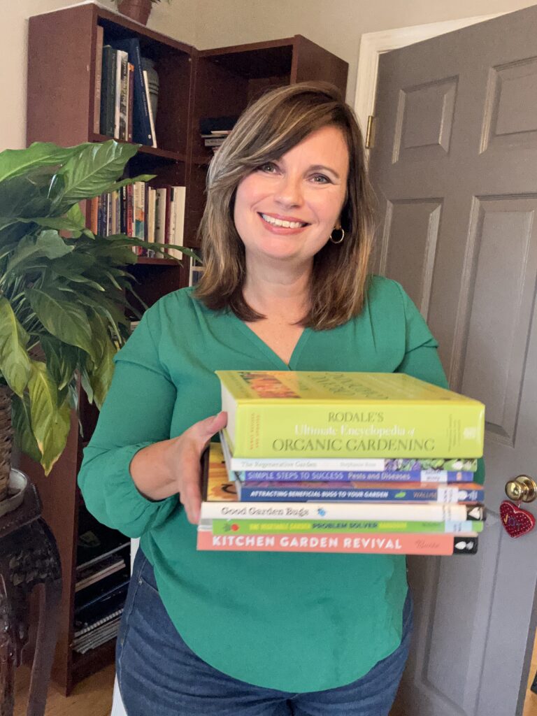 Image of woman holding books